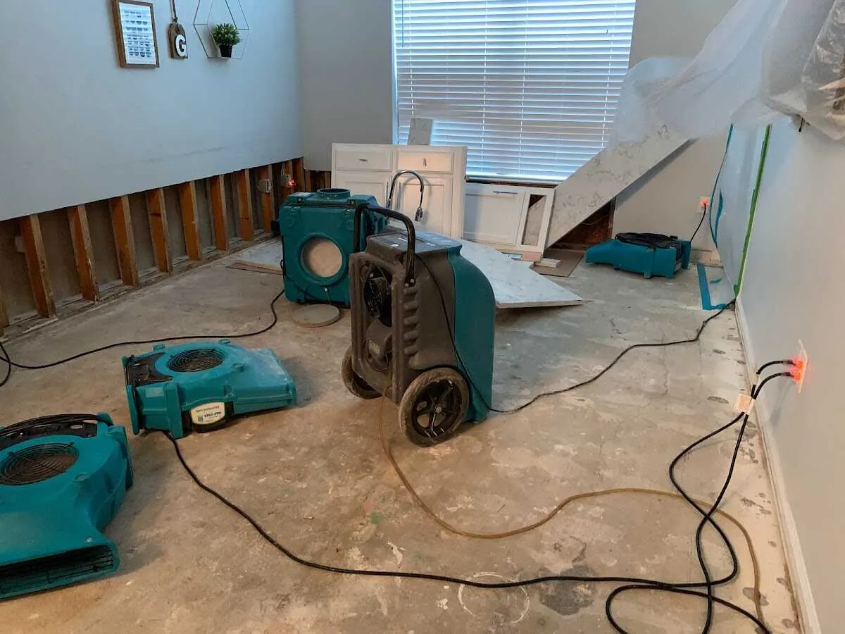 Dehumidifier in flood-cut room for Water Extraction & Removal in New London